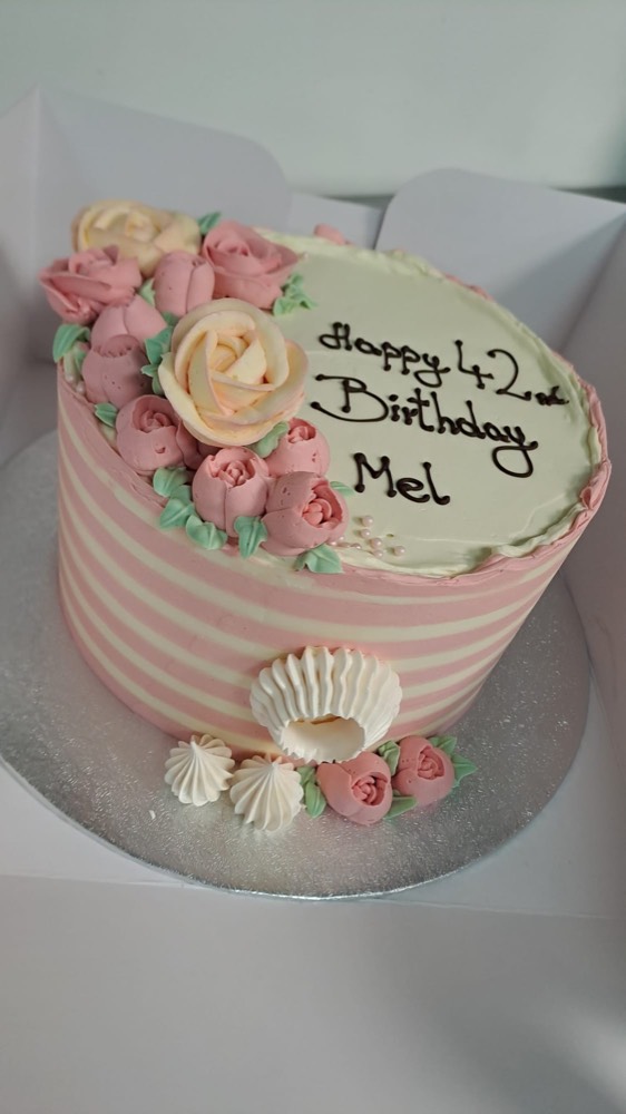 Pink buttercream cake with roses by The Rós Café, Co. Clare