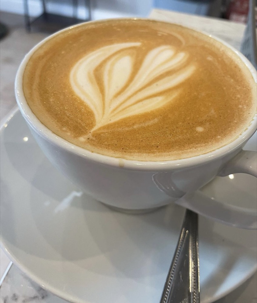 Barista coffee with latte art at The Rós Café, Newmarket on Fergus