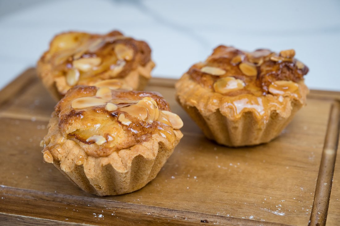 Almond tarts on a wooden board at The Rós Café, Newmarket on Fergus