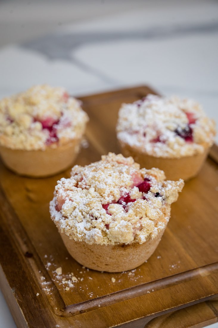 Berry crumble muffins on a wooden board at The Rós Café, Co. Clare
